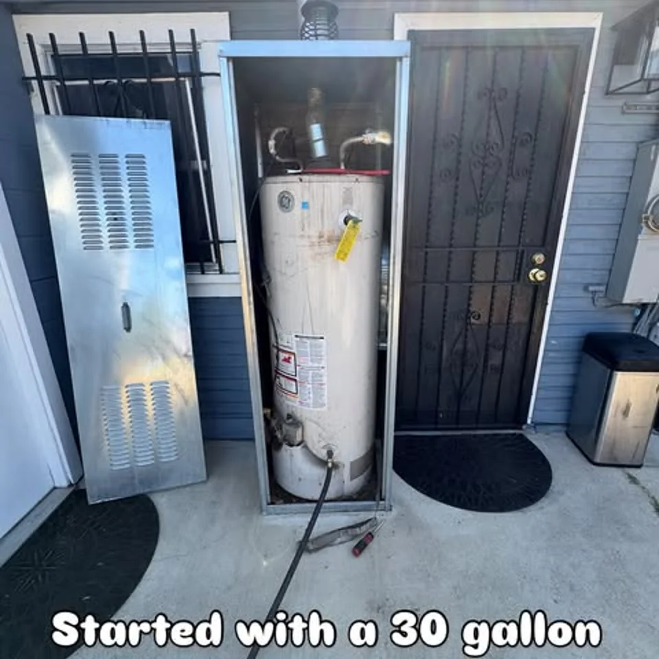 Fifty-gallon water heater and enclosure installed by R.G. Plumbing
